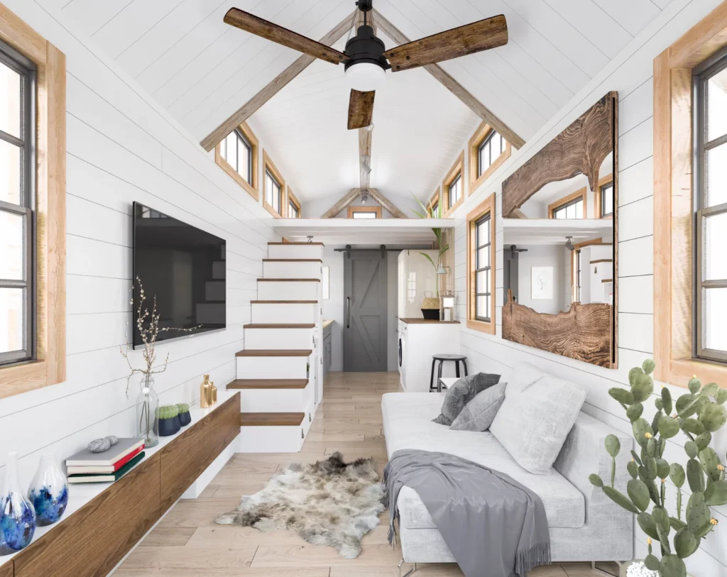 Modern tiny home living room with integrated staircase and ceiling fan