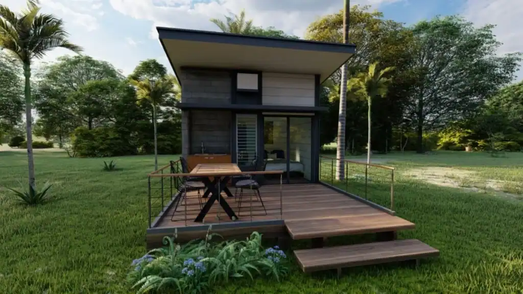 Charming Tiny House Surrounded by Greenery best tiny home builders with rustic black exterior and garden