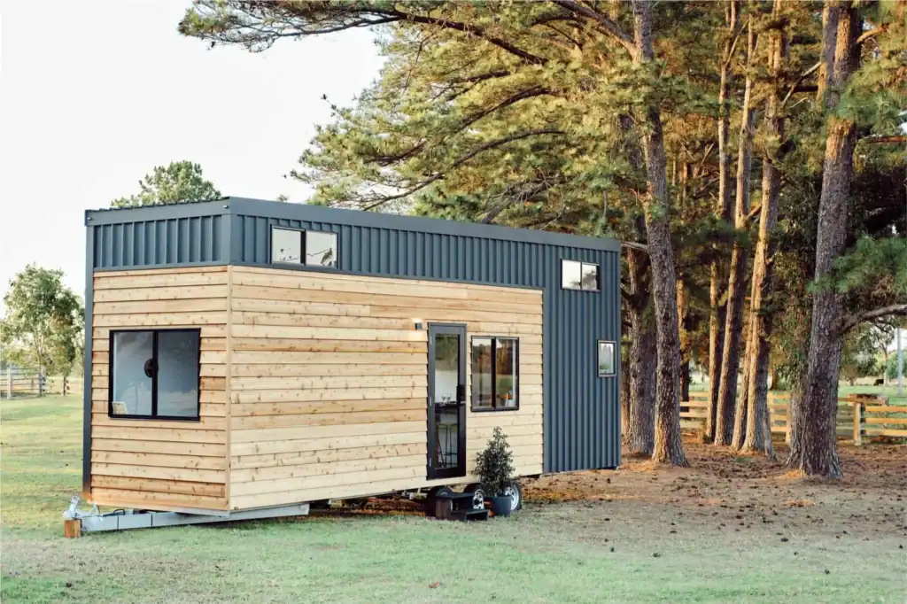 Tiny Cabin Exterior by Small Home Contractors Wooden tiny home designed by experienced small home contractors
