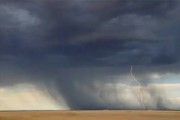 Thunderstorm with lightning illustrating weather-related tiny home safety risks.