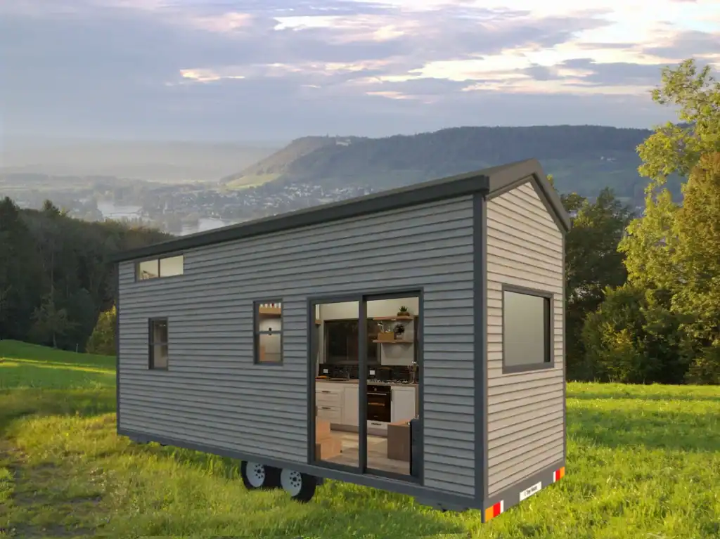 Modern exterior tiny home with loft and large windows
