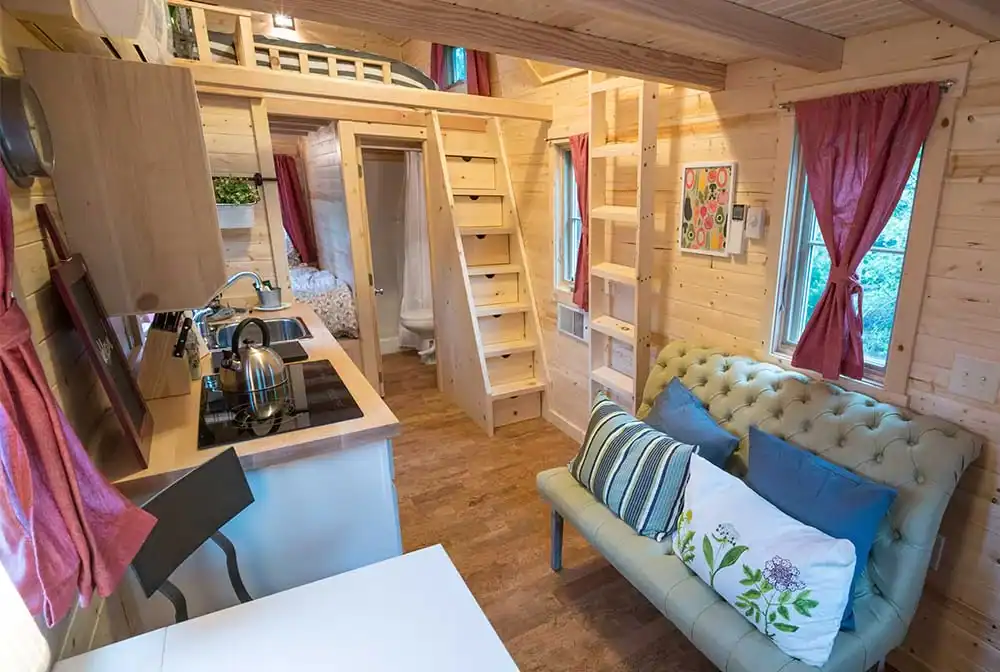 Compact living area designed by one of the best tiny home manufacturers for 2025.